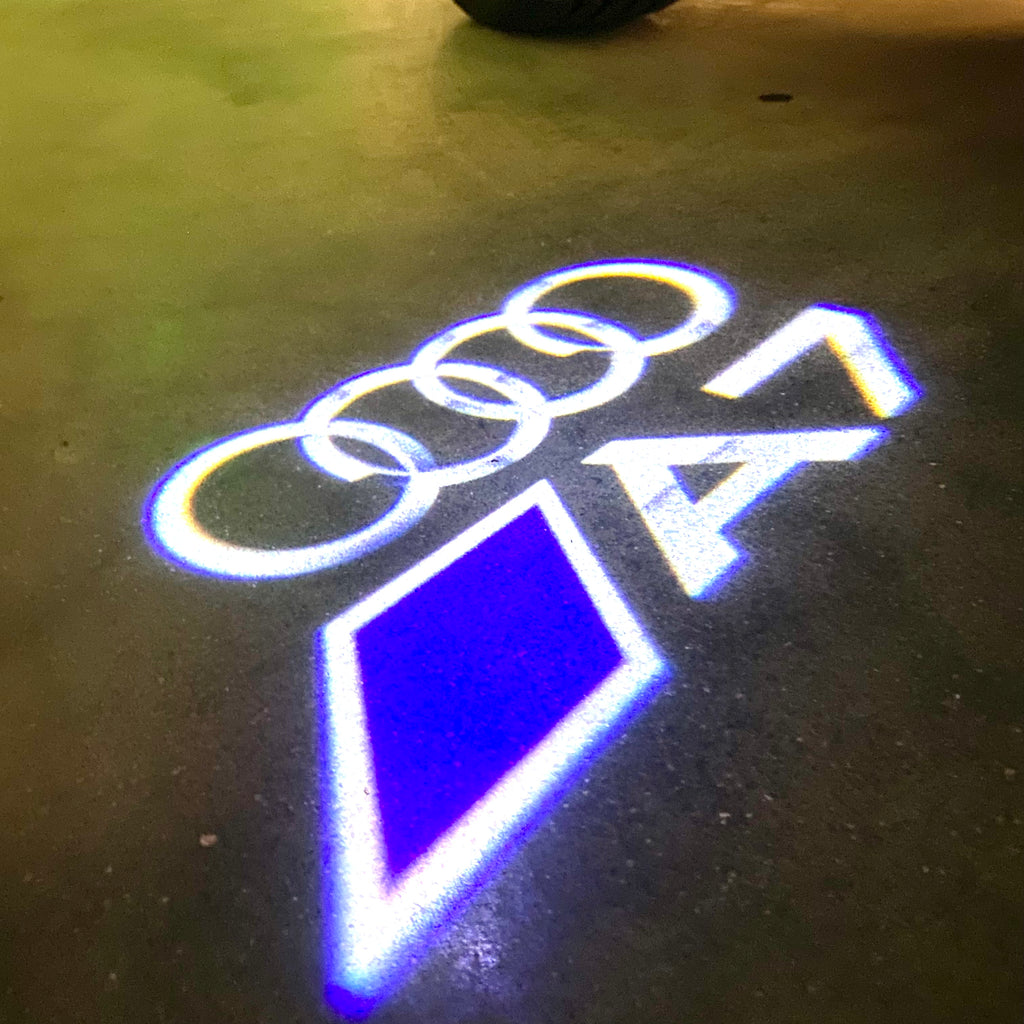 AUDI LOGO PROJECTOT LIGHTS Nr.120 (Menge 1 = 2 Logofolien /2 Türleuchten)
