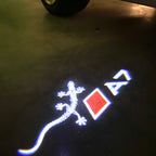 LUCES DE PROYECTOR LOGO AUDI No 120 (cantidad 1 = 2 películas con logotipo / 2 luces de puerta)