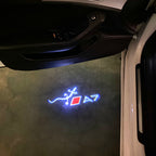 LUCES DE PROYECTOR LOGO AUDI No 120 (cantidad 1 = 2 películas con logotipo / 2 luces de puerta)