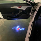 LUCES DE PROYECTOR LOGO AUDI No 120 (cantidad 1 = 2 películas con logotipo / 2 luces de puerta)
