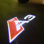 AUDI LOGO PROJECTOT LIGHTS Nr.120 (الكمية 1 = 2 Logo Films /2 أضواء الباب)