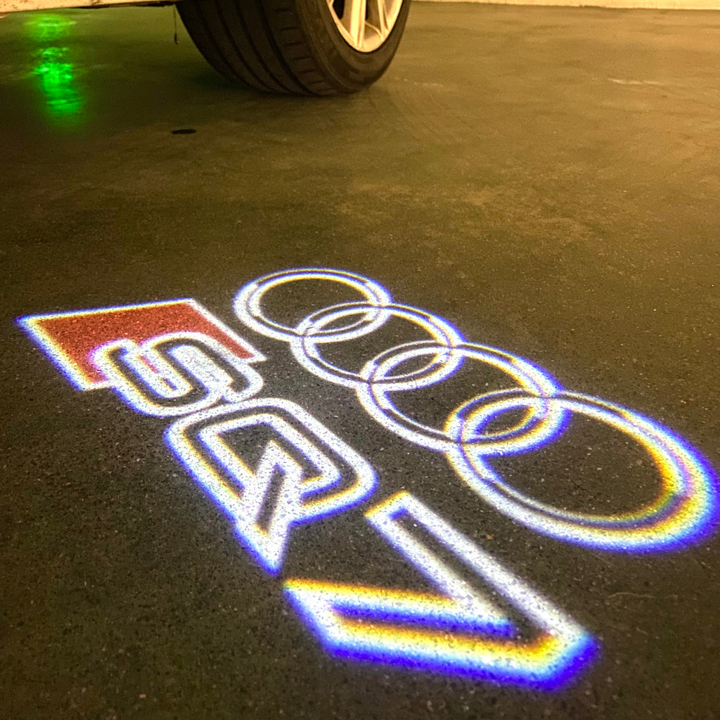 AUDI LOGO PROJECTOT LIGHTS Nr.120 (Menge 1 = 2 Logofolien /2 Türleuchten)