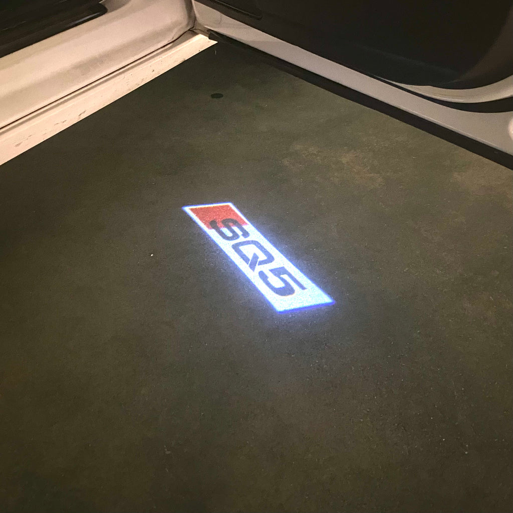 AUDI LOGO PROJECTOT LIGHTS Nr.120 (Menge 1 = 2 Logofolien /2 Türleuchten)
