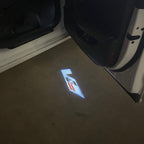 AUDI LOGO PROJECTOT LIGHTS Nr.19 (الكمية 1 = 2 Logo Films /2 أضواء الباب)