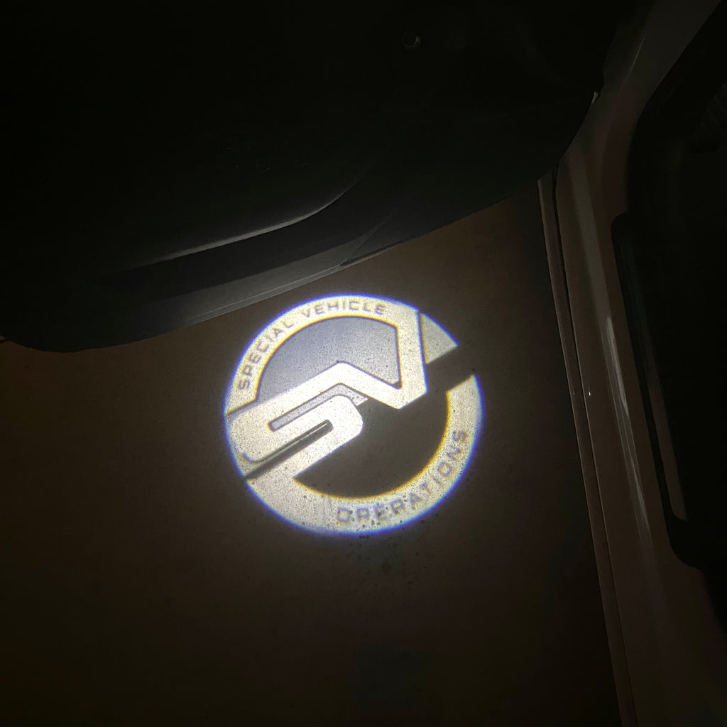 LUCES DE PROYECTOR CON LOGO Land Rover Nr.04 (cantidad 1 = 1 juegos / 2 luces de puerta)