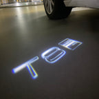 LUCI PROIETTORI LOGO Volvo Nr.82 (quantità 1 = 2 Logo Film / 2 luci porta)