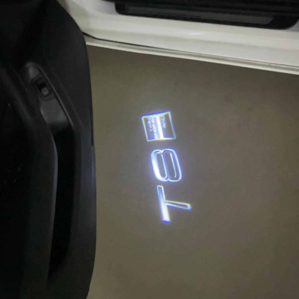 LUCI PROIETTORI LOGO Volvo Nr.82 (quantità 1 = 2 Logo Film / 2 luci porta)
