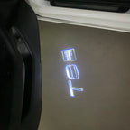LUCI PROIETTORI LOGO Volvo Nr.82 (quantità 1 = 2 Logo Film / 2 luci porta)