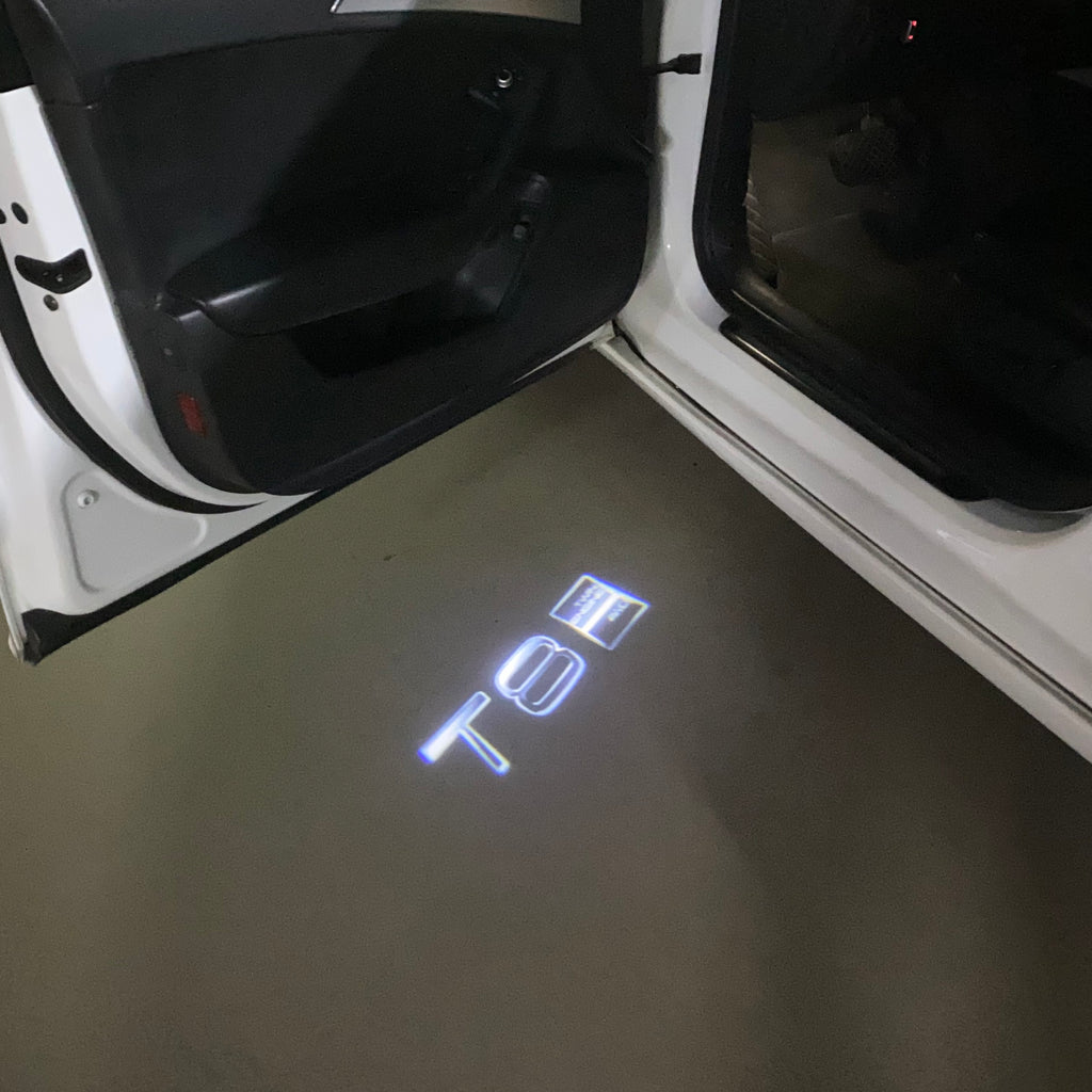 LUCI PROIETTORI LOGO Volvo Nr.82 (quantità 1 = 2 Logo Film / 2 luci porta)