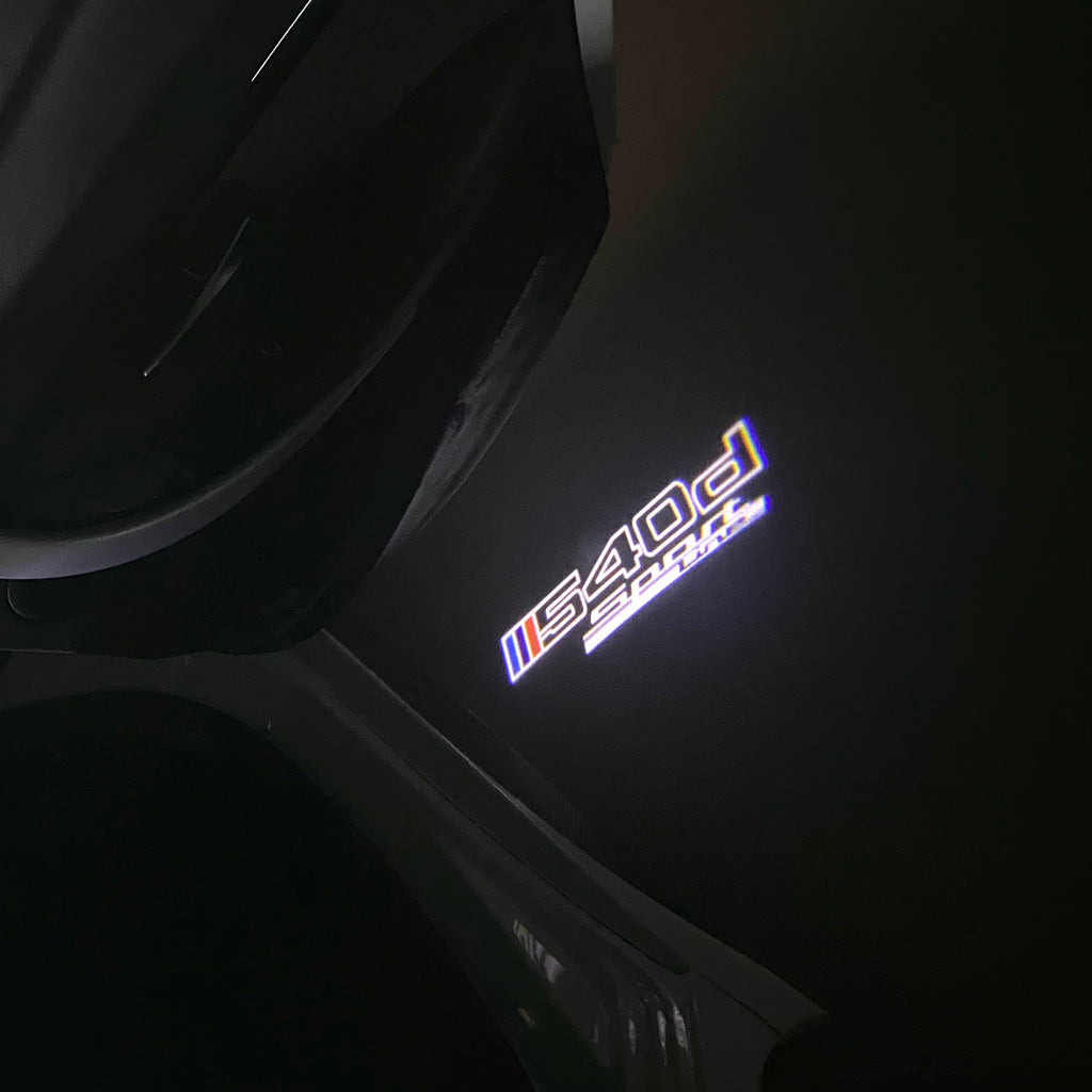 ÉCLAIRAGE DE PROJECTEUR BMW M3 LOGO Nr.24 (quantité 1 = 1 jeux / 2 feux de porte)