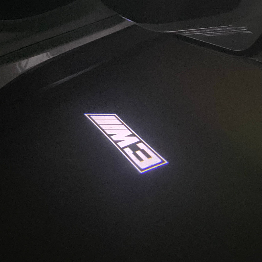 BMW M3 LOGO PROJECTOR LIGHTS Nr.24 (الكمية 1 = 1 مجموعة / 2 أضواء باب)