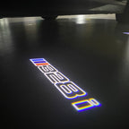 BMW M3 LOGO PROJECTOR LIGHTS Nr.24 (الكمية 1 = 1 مجموعة / 2 أضواء باب)