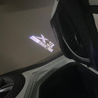 BMW X3 S Drive 18 LOGO PROJECTOT LIGHTS (quantity 1 = 1 sets/2 door lights) Nr.6024q0t26