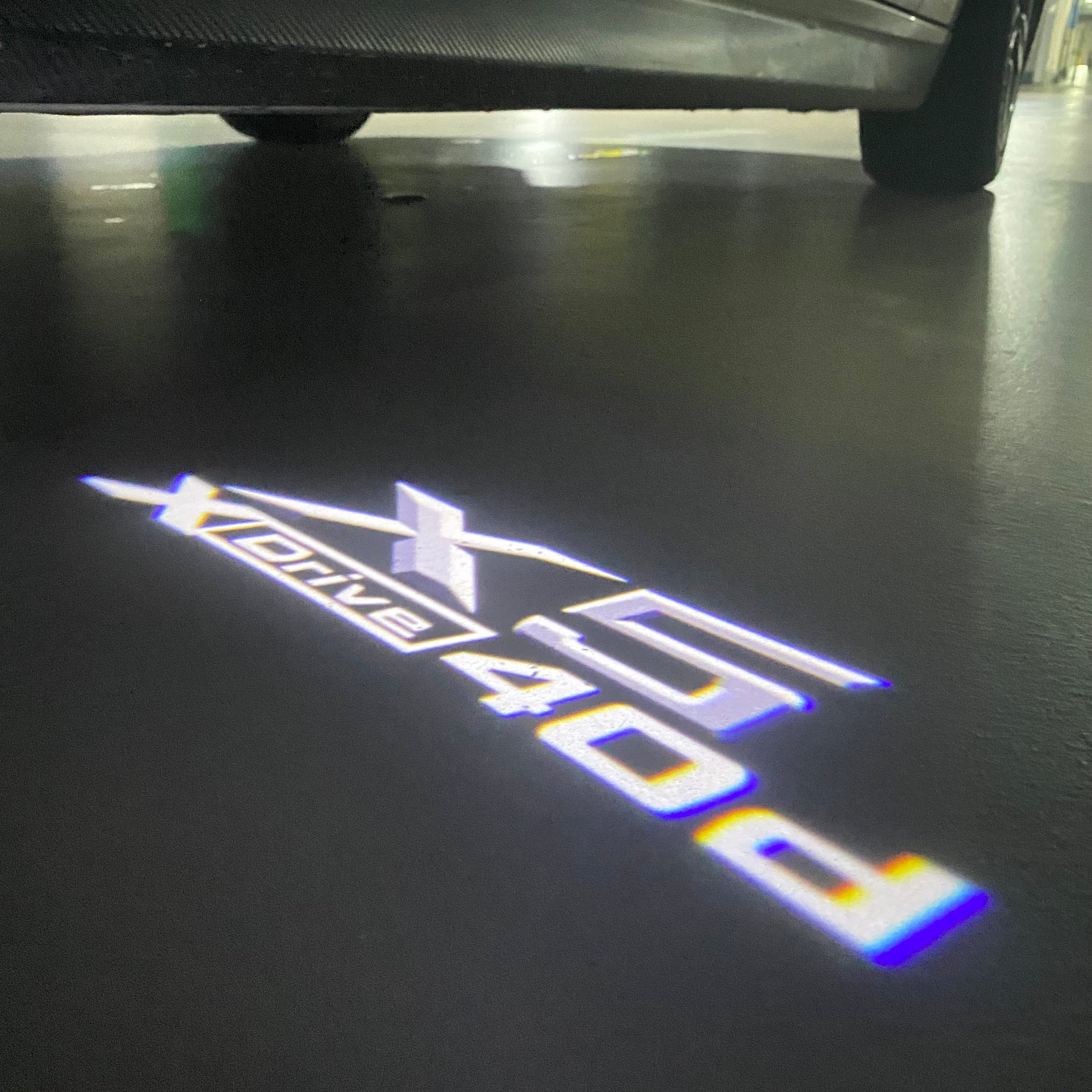 BMW  X5  X Drive 40d  LOGO PROJECTOT LIGHTS (quantity 1 = 1 sets/2 door lights) Nr.6024q0t082