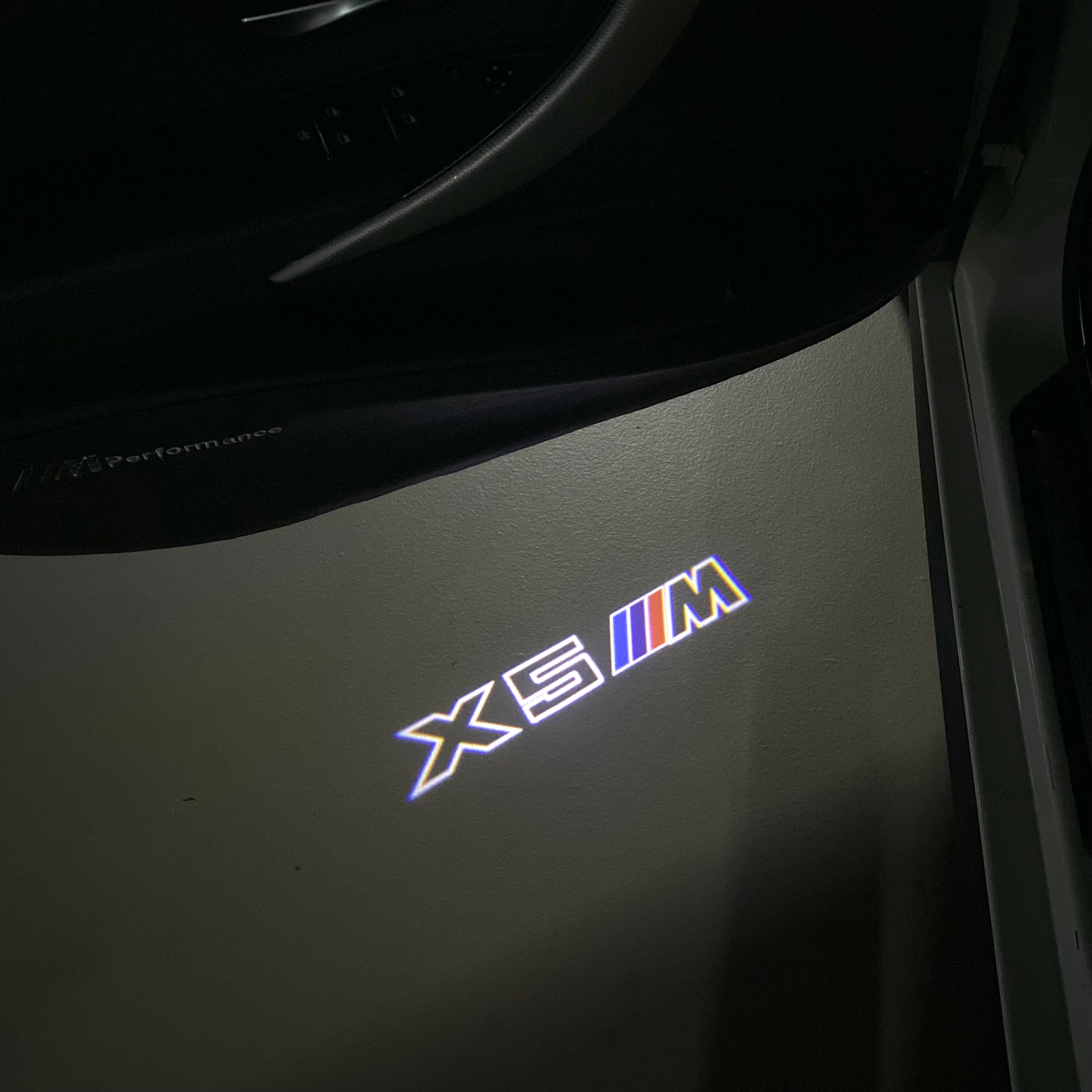 BMW X5M LOGO PROJECTOT LIGHTS (quantity 1 = 1 sets/2 door lights) Nr.6024q0t071