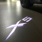 BMW X5    LOGO PROJECTOT LIGHTS (quantity 1 = 1 sets/2 door lights) Nr.6024q0t083