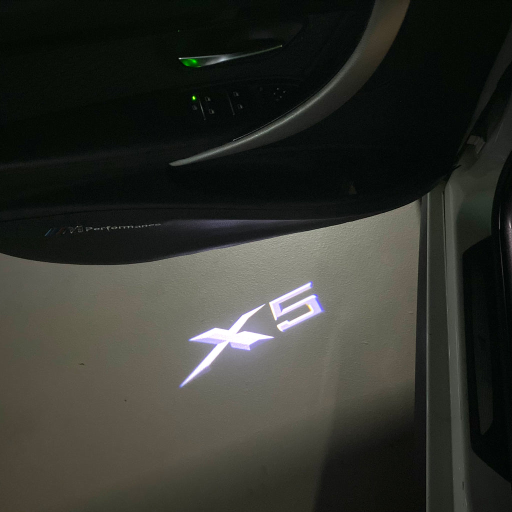 BMW X5    LOGO PROJECTOT LIGHTS (quantity 1 = 1 sets/2 door lights) Nr.6024q0t083
