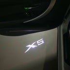 BMW X5    LOGO PROJECTOT LIGHTS (quantity 1 = 1 sets/2 door lights) Nr.6024q0t083
