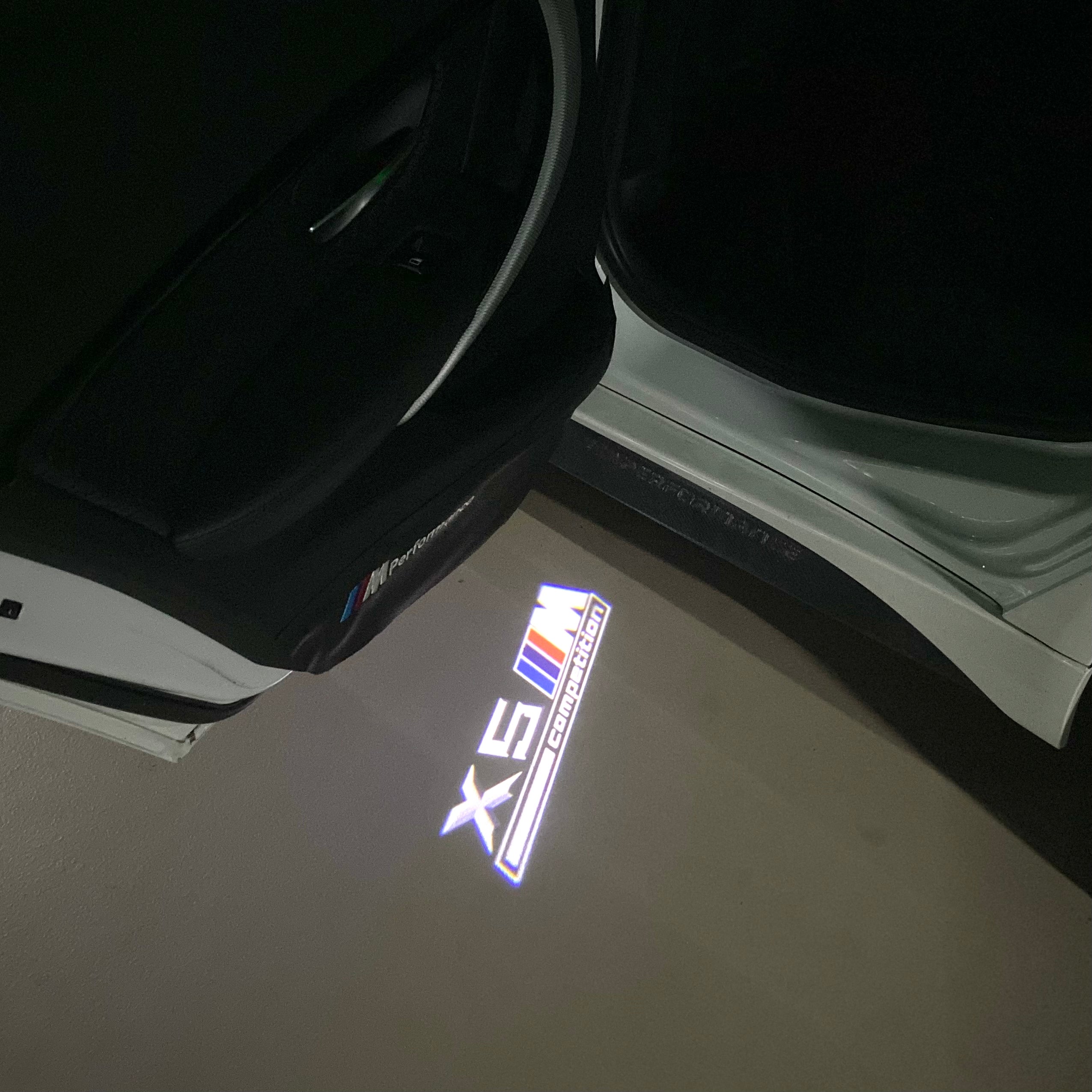 BMW X5M  LOGO PROJECTOT LIGHTS (quantity 1 = 1 sets/2 door lights) Nr.6024q0t049