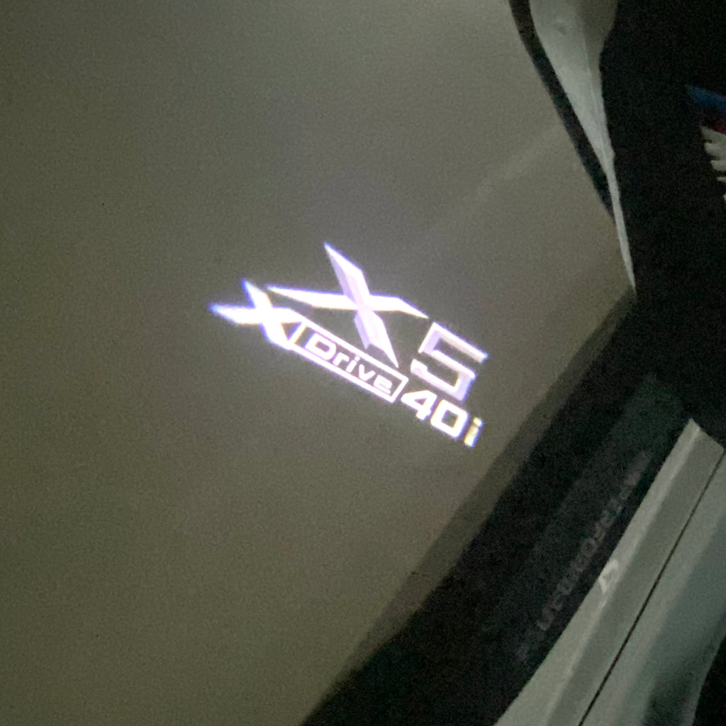 BMW X5 Xdrive 40i LOGO PROJECTOT LIGHTS (quantity 1 = 1 sets/2 door lights) Nr.6024q0t061