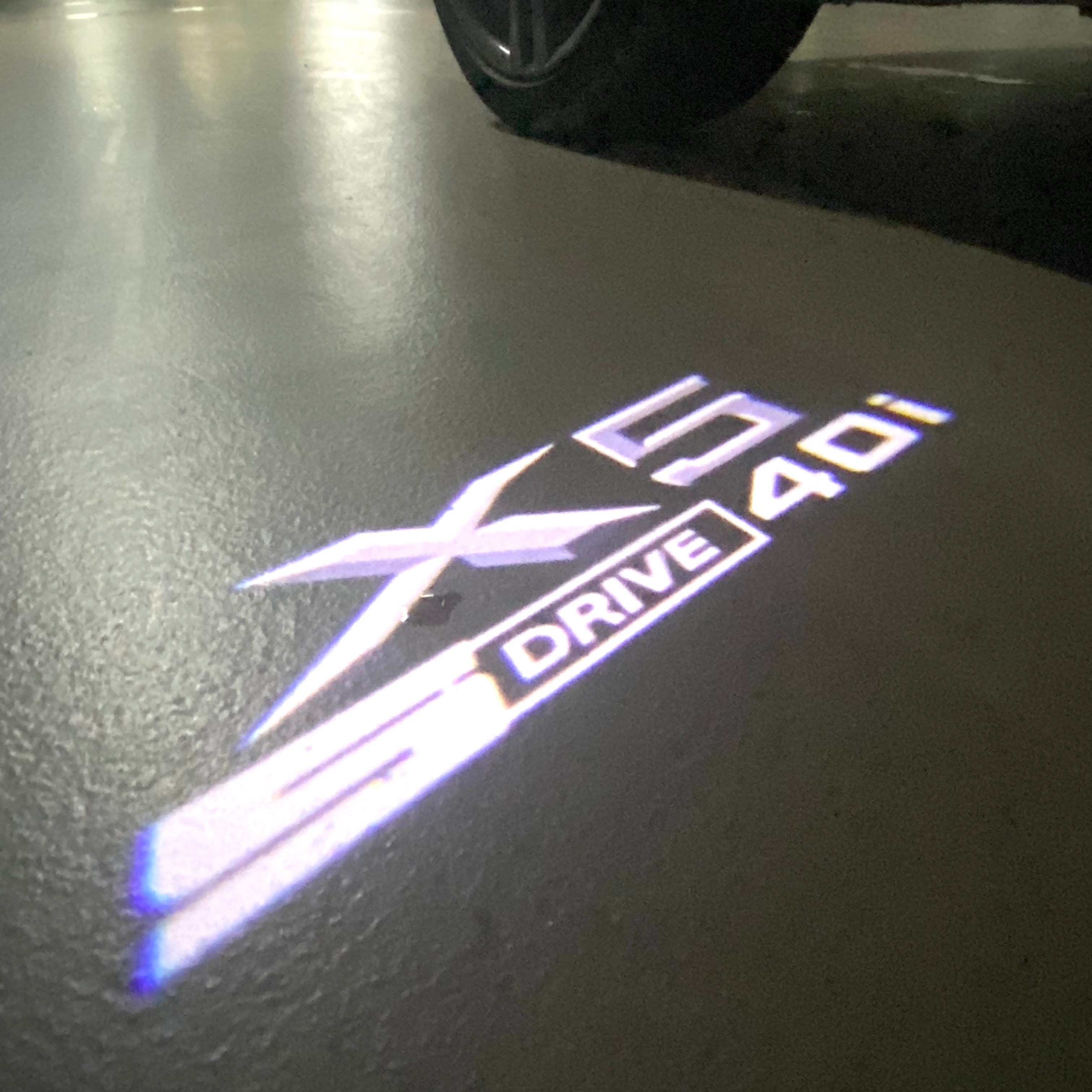 BMW X5  S drive 40i LOGO PROJECTOT LIGHTS (quantity 1 = 1 sets/2 door lights) Nr.6024q0t047