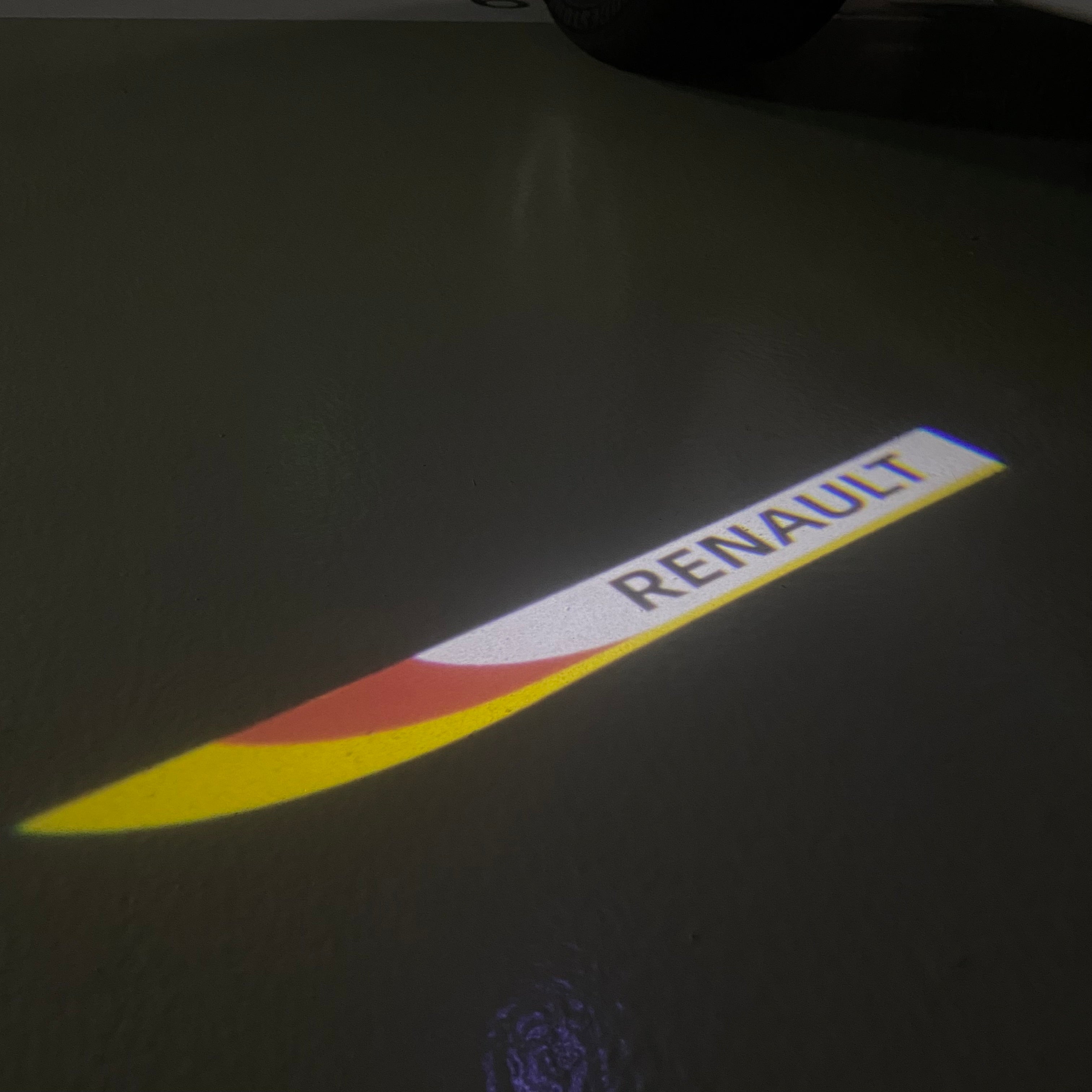RENAULT ORIGINAL LOGO PROJECROTR LIGHTS Nr.0910 (quantity  1 =  2 Logo Film & 2 door lights)