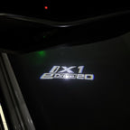 BMW iX1 E Drive  LOGO PROJECTOT LIGHTS (quantity 1 = 1 sets/2 door lights) Nr.6024q140