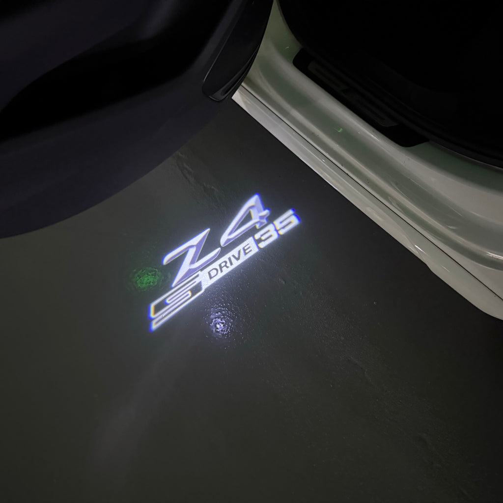 LUCES DE PROYECTOR DEL LOGOTIPO BMW M3 Nr.24 (cantidad 1 = 1 juegos / 2 luces de puerta)