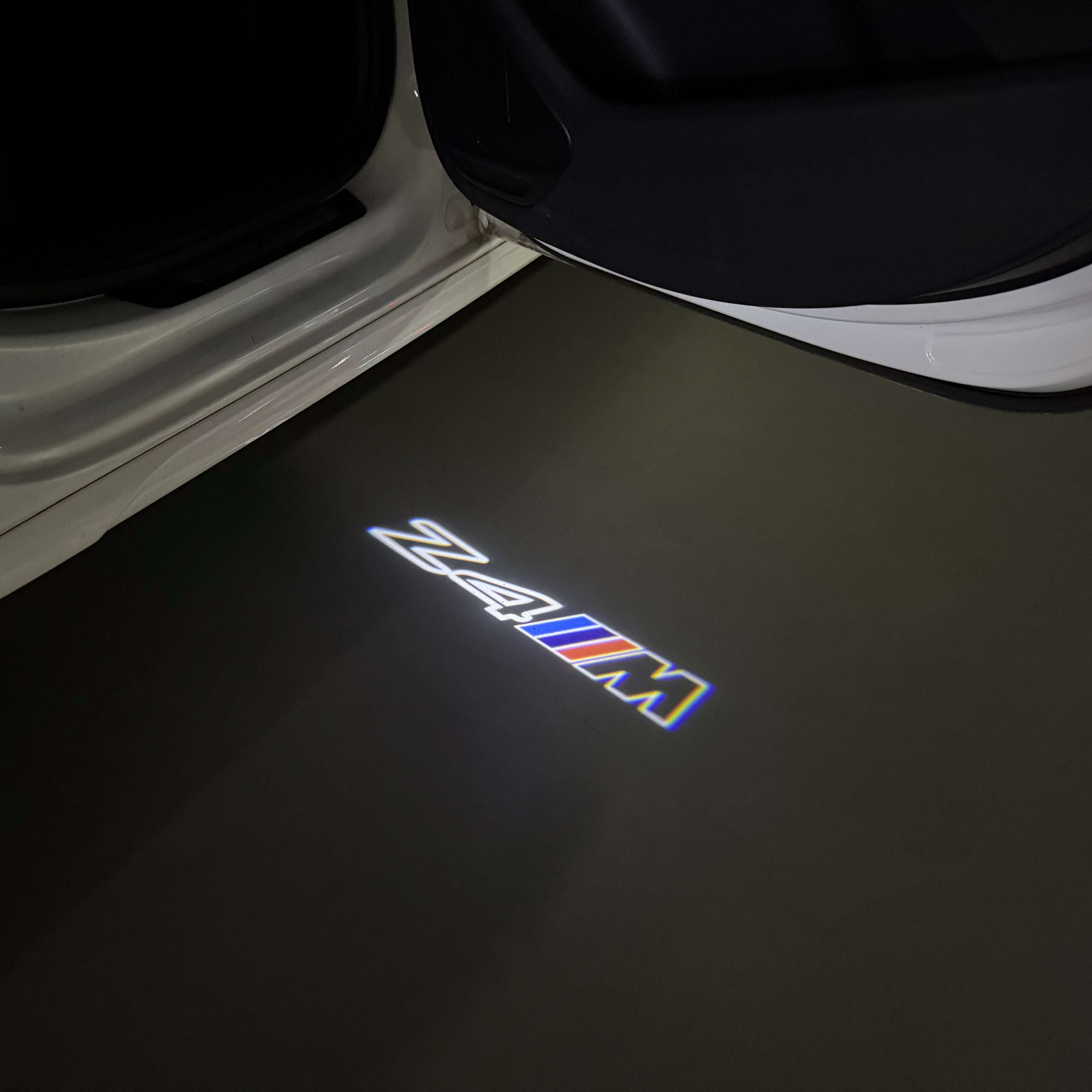 BMW Z4M  LOGO PROJECTOT LIGHTS (quantity 1 = 1 sets/2 door lights) Nr.6024q0t0132
