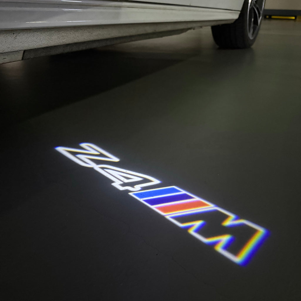 BMW Z4M  LOGO PROJECTOT LIGHTS (quantity 1 = 1 sets/2 door lights) Nr.6024q0t0132