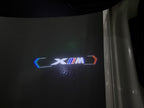 BMW XM    LOGO PROJECTOT LIGHTS (quantity 1 = 1 sets/2 door lights) Nr.6024q0t0123