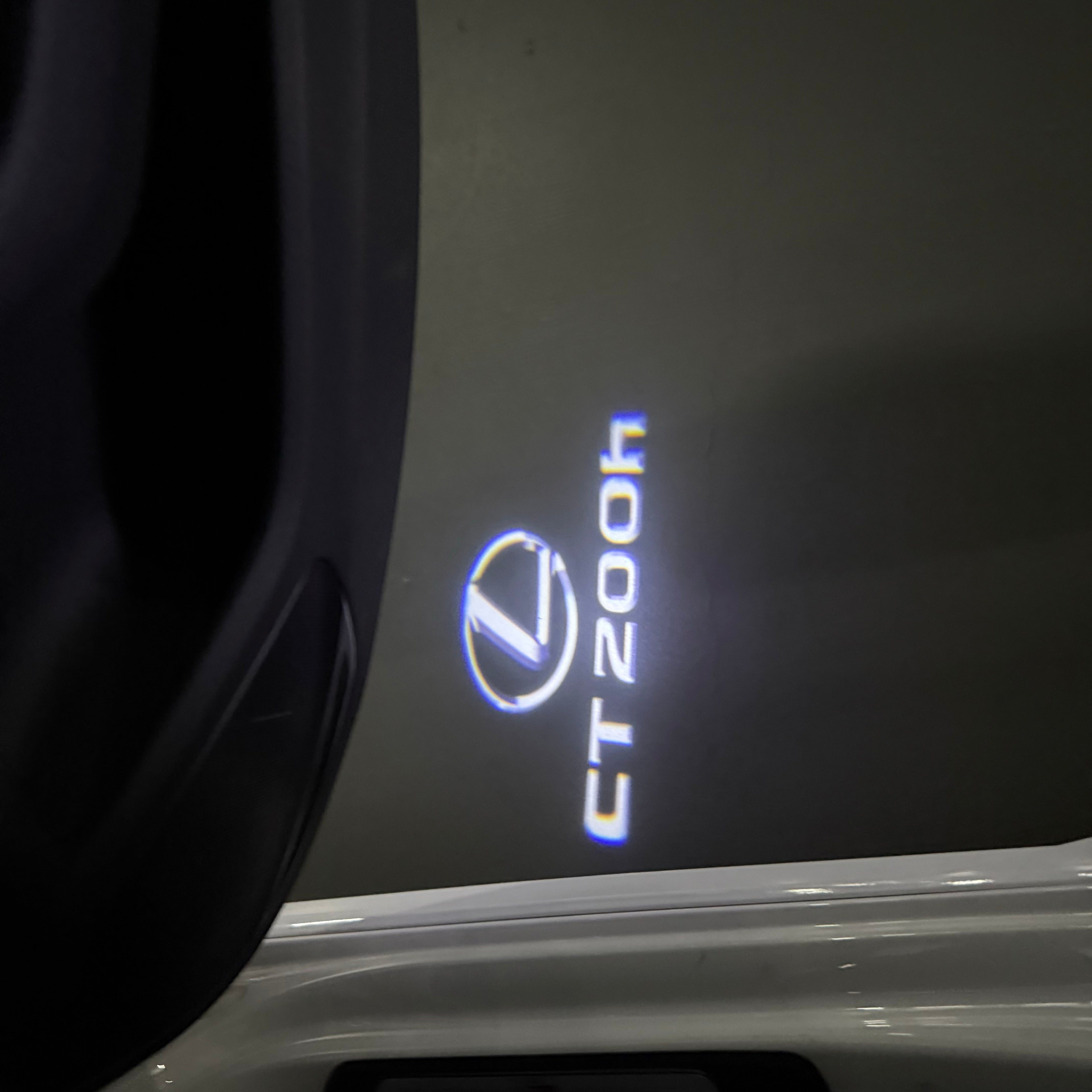 LEXUS CT 200h  LOGO PROJECROTR LIGHTS (quantity 1 = 1 sets/2 door lights)Nr.01a87
