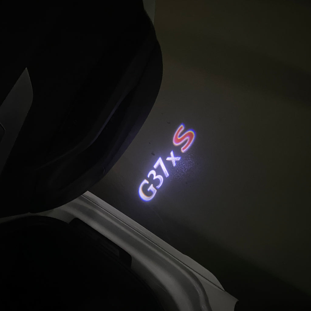 INFINITI G37xS LOGO PROJECTOR LIGHTS Nr.35 (Anzahl 1 = 1 Sets / 2 Türleuchten)