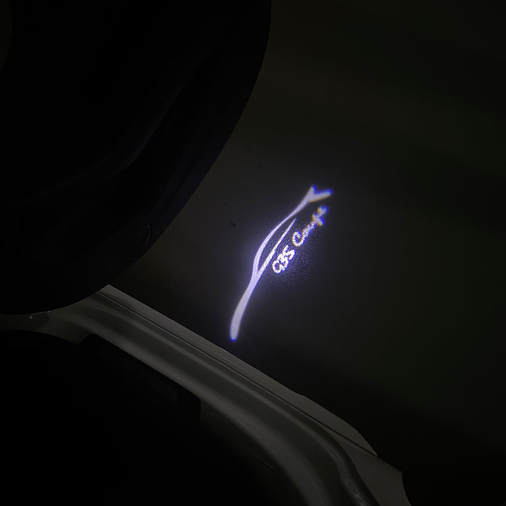 ÉCLAIRAGE DE PROJECTEUR INFINITI G35 LOGO N ° 91 (quantité 1 = 1 jeux / 2 lumières de porte)