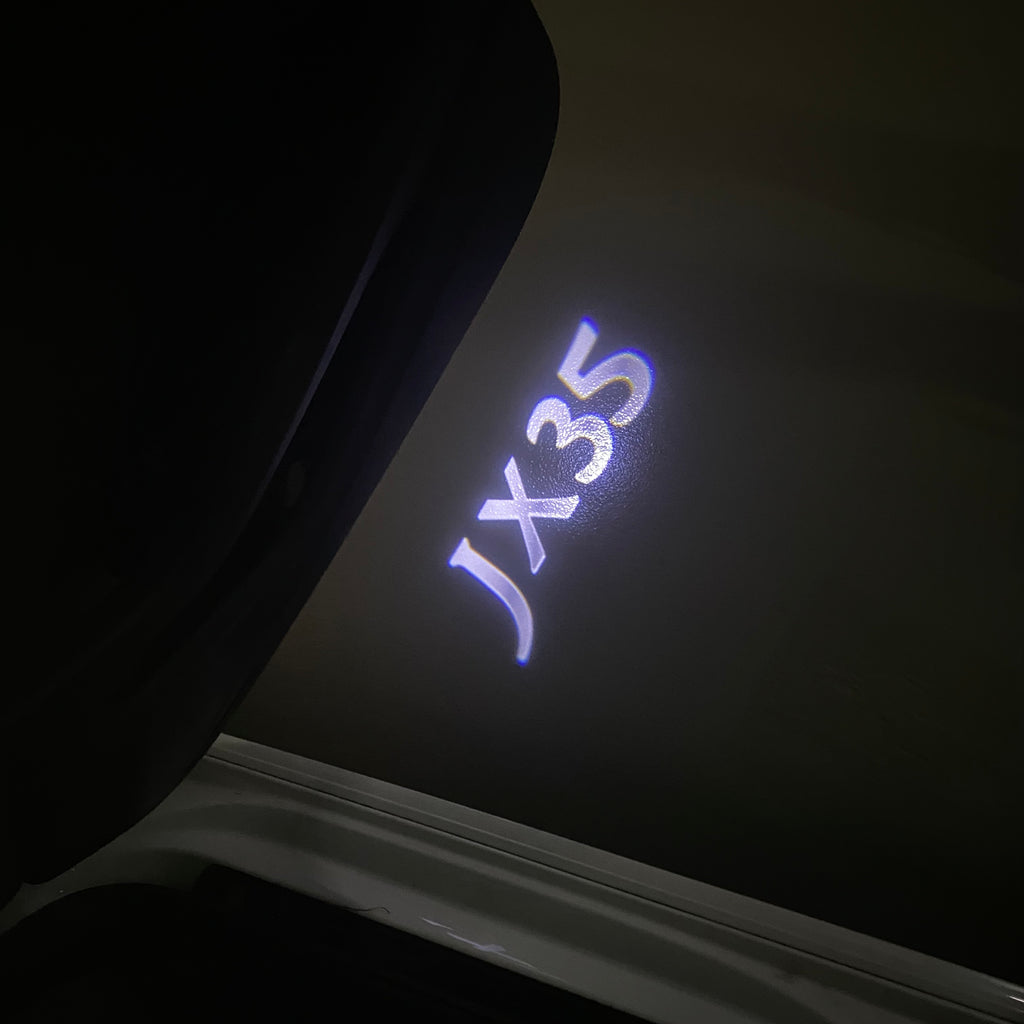 LUCI PROIETTORI LOGO INFINITI JX35 Nr.64 (quantità 1 = 1 set / 2 luci porta)