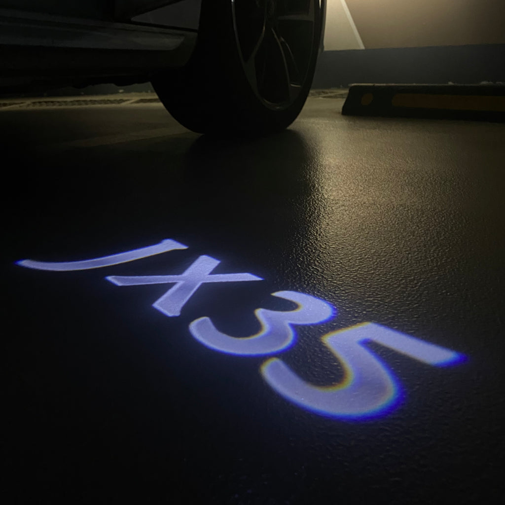 LUCI PROIETTORI LOGO INFINITI JX35 Nr.64 (quantità 1 = 1 set / 2 luci porta)