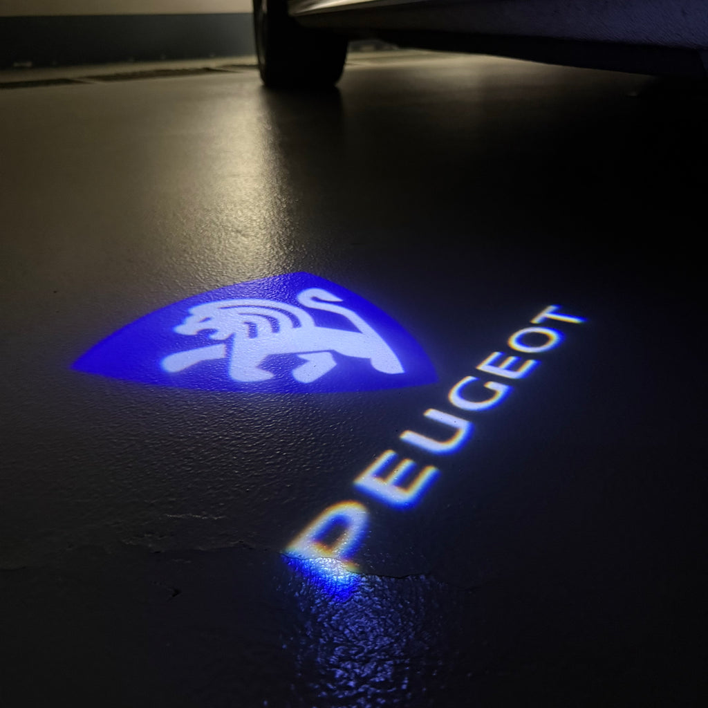 PEUGEOT ORIGINAL  LOGO PROJECTOT LIGHTS (quantity 1 = 1 sets/2 door lights) Nr.6024q70
