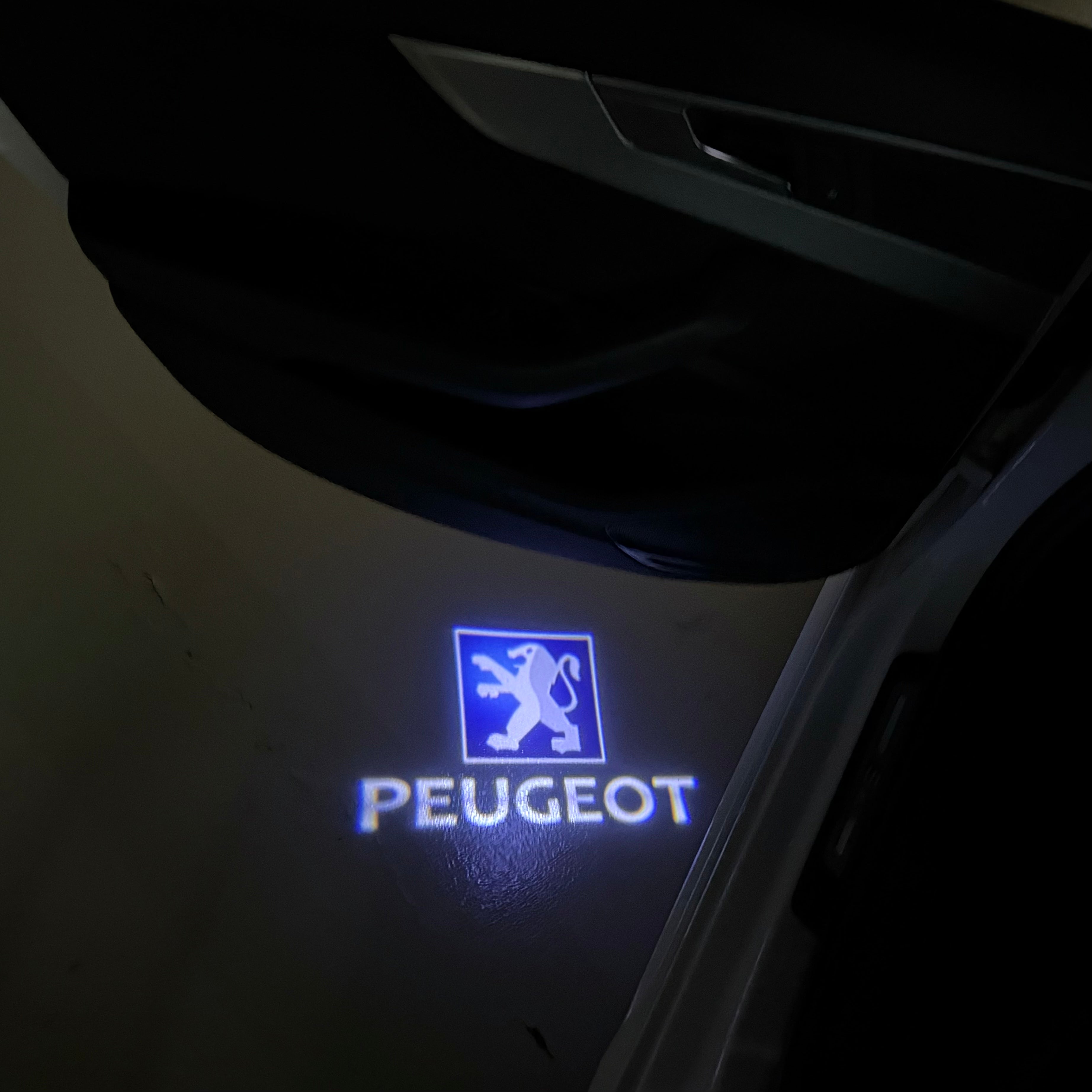 PEUGEOT ORIGINAL  LOGO PROJECTOT LIGHTS (quantity 1 = 1 sets/2 door lights) Nr.6024q68