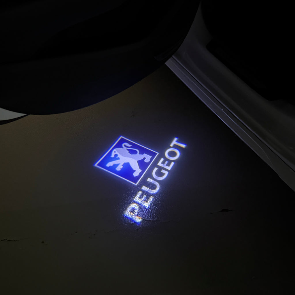 PEUGEOT ORIGINAL  LOGO PROJECTOT LIGHTS (quantity 1 = 1 sets/2 door lights) Nr.6024q68