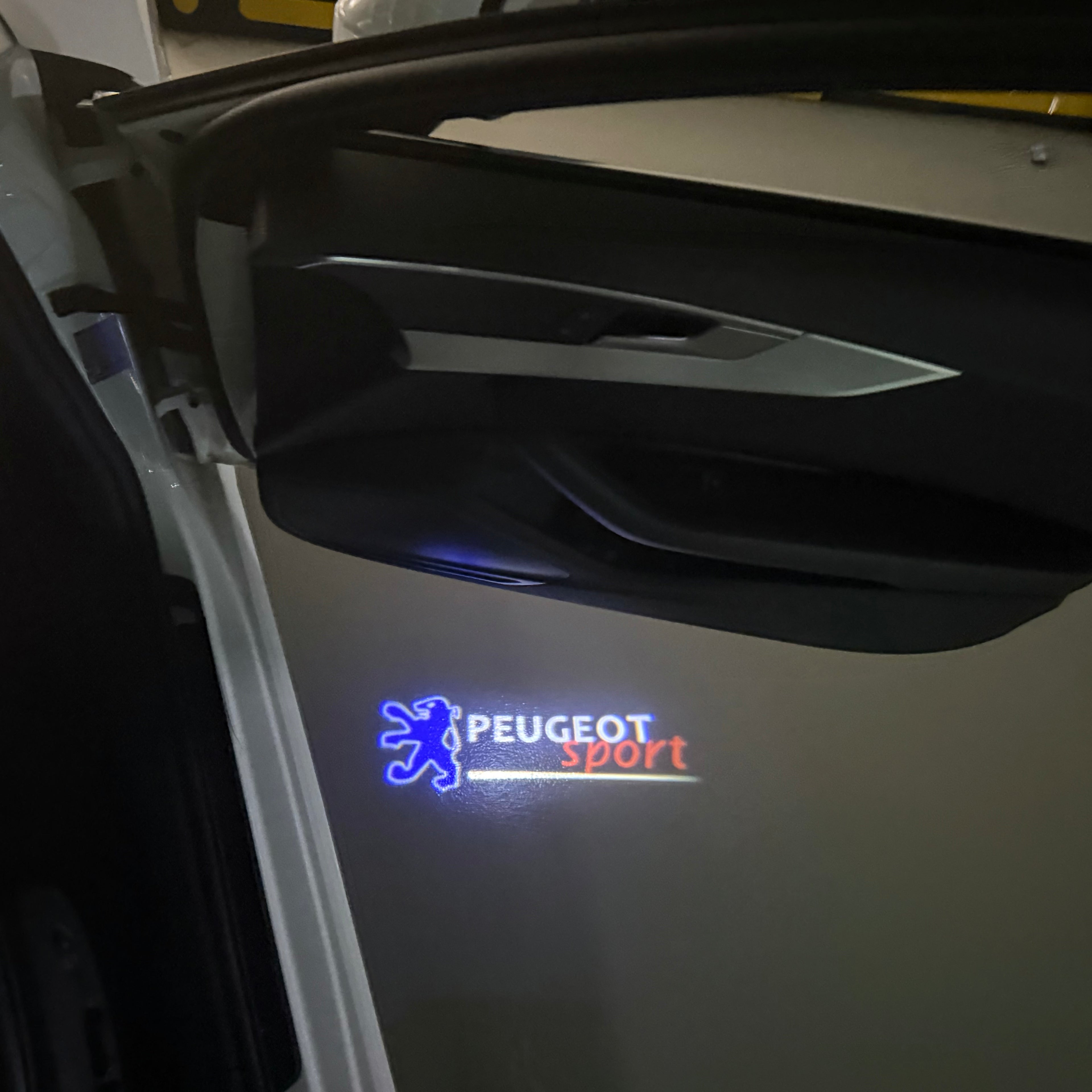 PEUGEOT SPORT  LOGO PROJECTOT LIGHTS (quantity 1 = 1 sets/2 door lights) Nr.6024q77