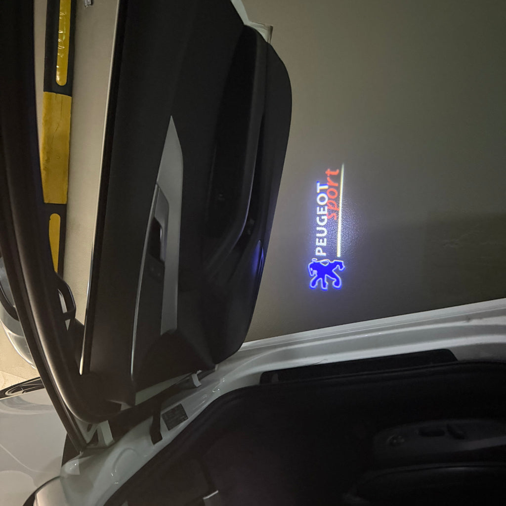 PEUGEOT SPORT  LOGO PROJECTOT LIGHTS (quantity 1 = 1 sets/2 door lights) Nr.6024q77