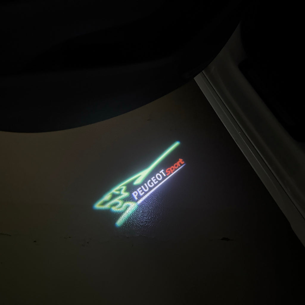 PEUGEOT SPORT  LOGO PROJECTOT LIGHTS (quantity 1 = 1 sets/2 door lights) Nr.6024q75