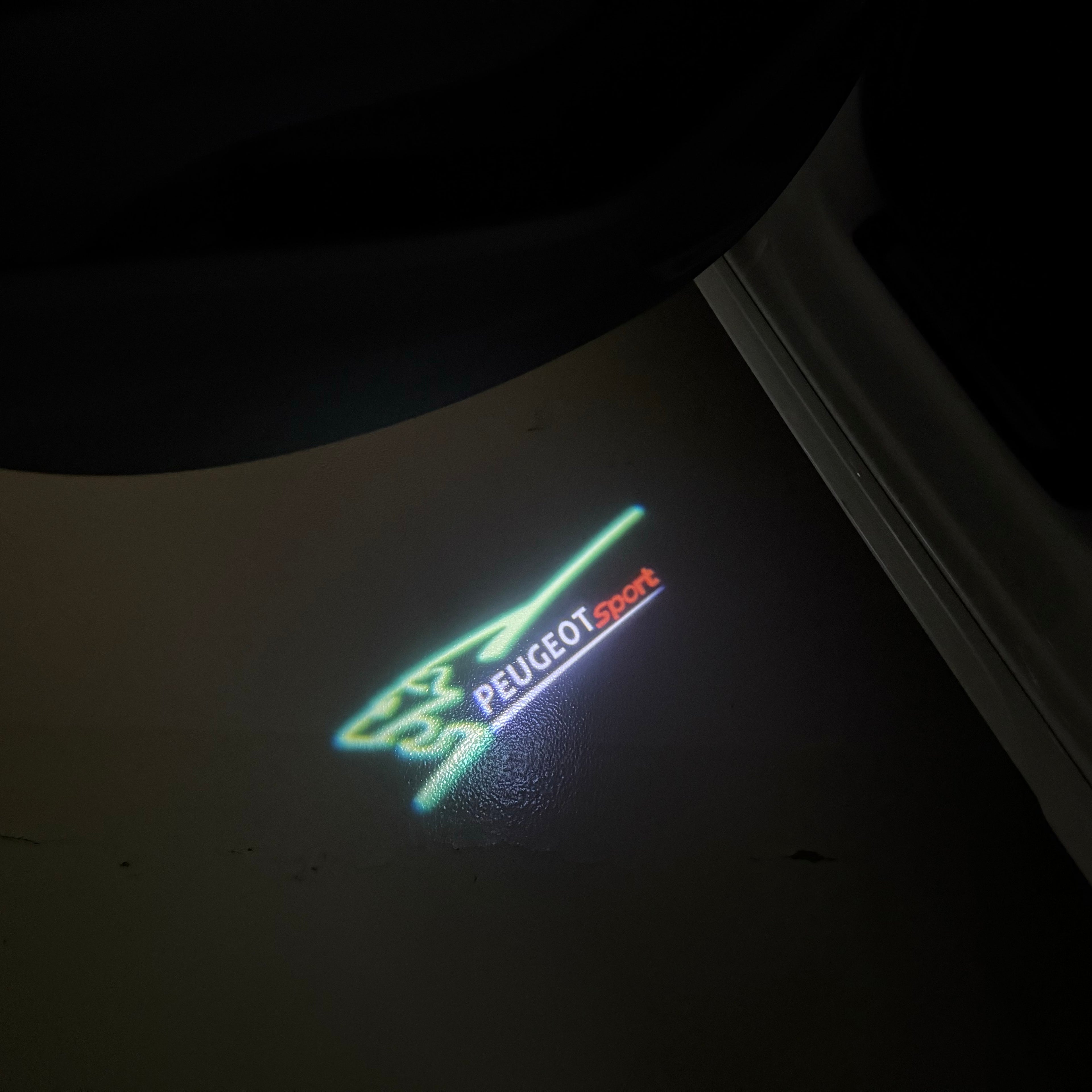 PEUGEOT SPORT  LOGO PROJECTOT LIGHTS (quantity 1 = 1 sets/2 door lights) Nr.6024q75