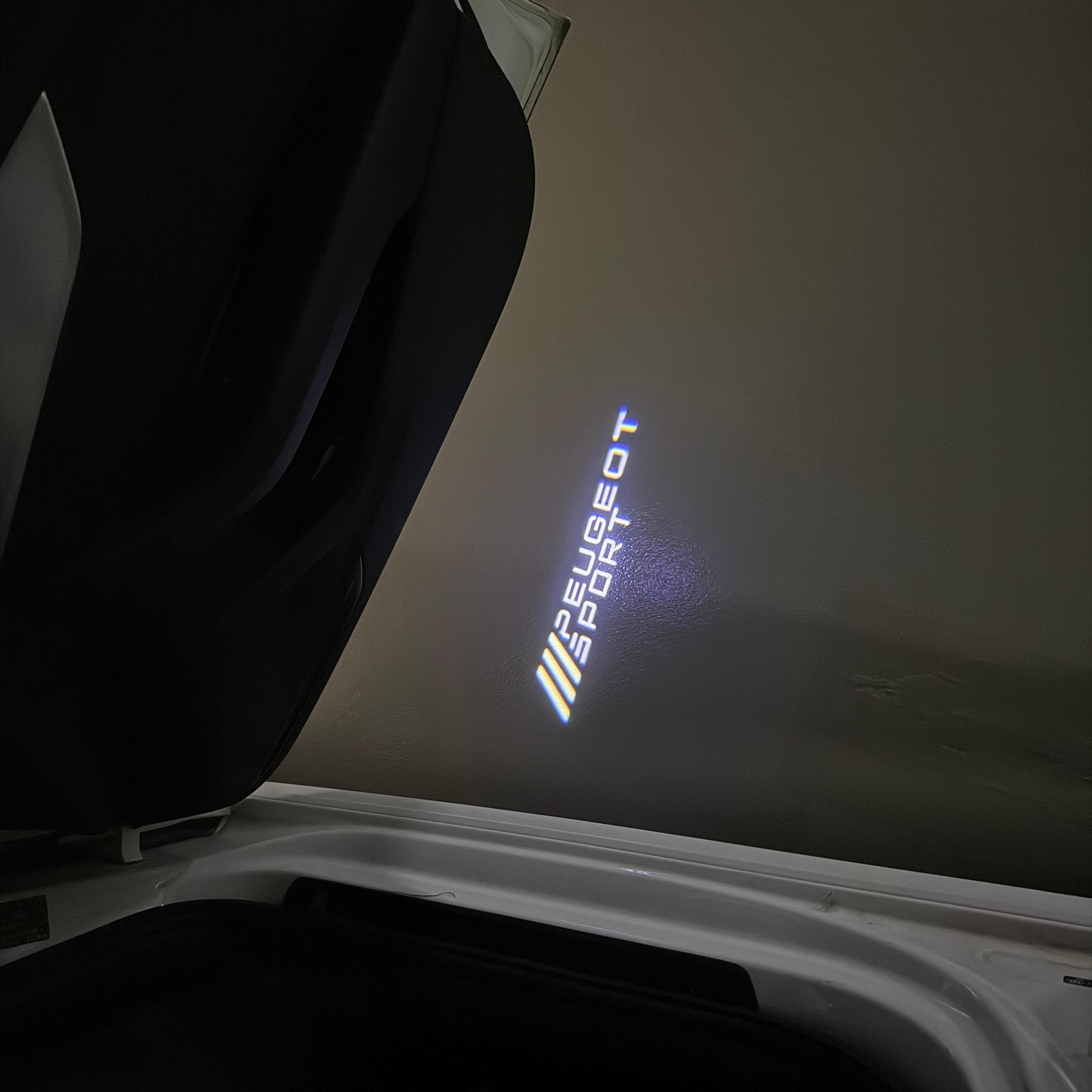 PEUGEOT SPORT  LOGO PROJECTOT LIGHTS (quantity 1 = 1 sets/2 door lights) Nr.6024q76