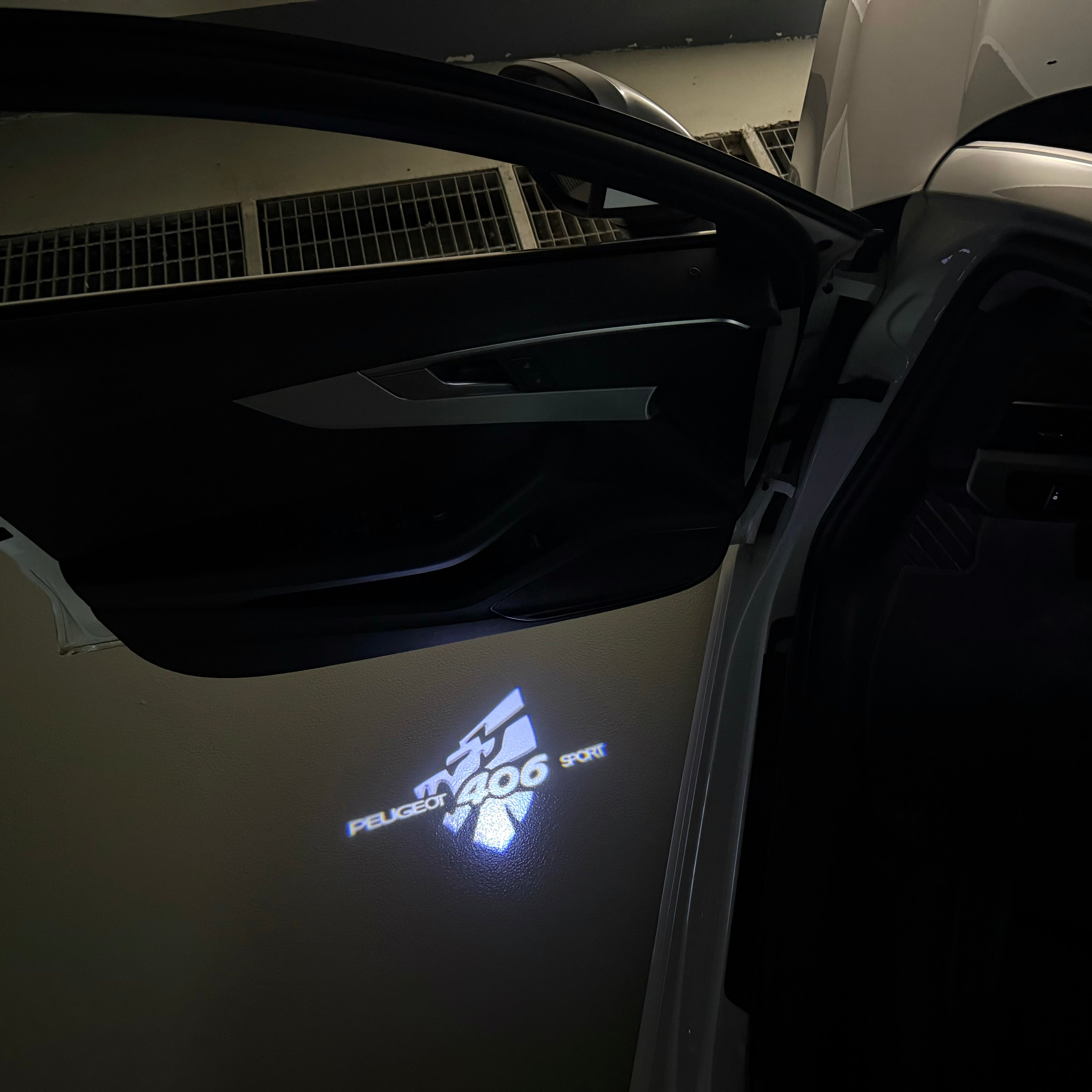 PEUGEOT  406 SPORT  LOGO PROJECTOT LIGHTS (quantity 1 = 1 sets/2 door lights) Nr.6024q30