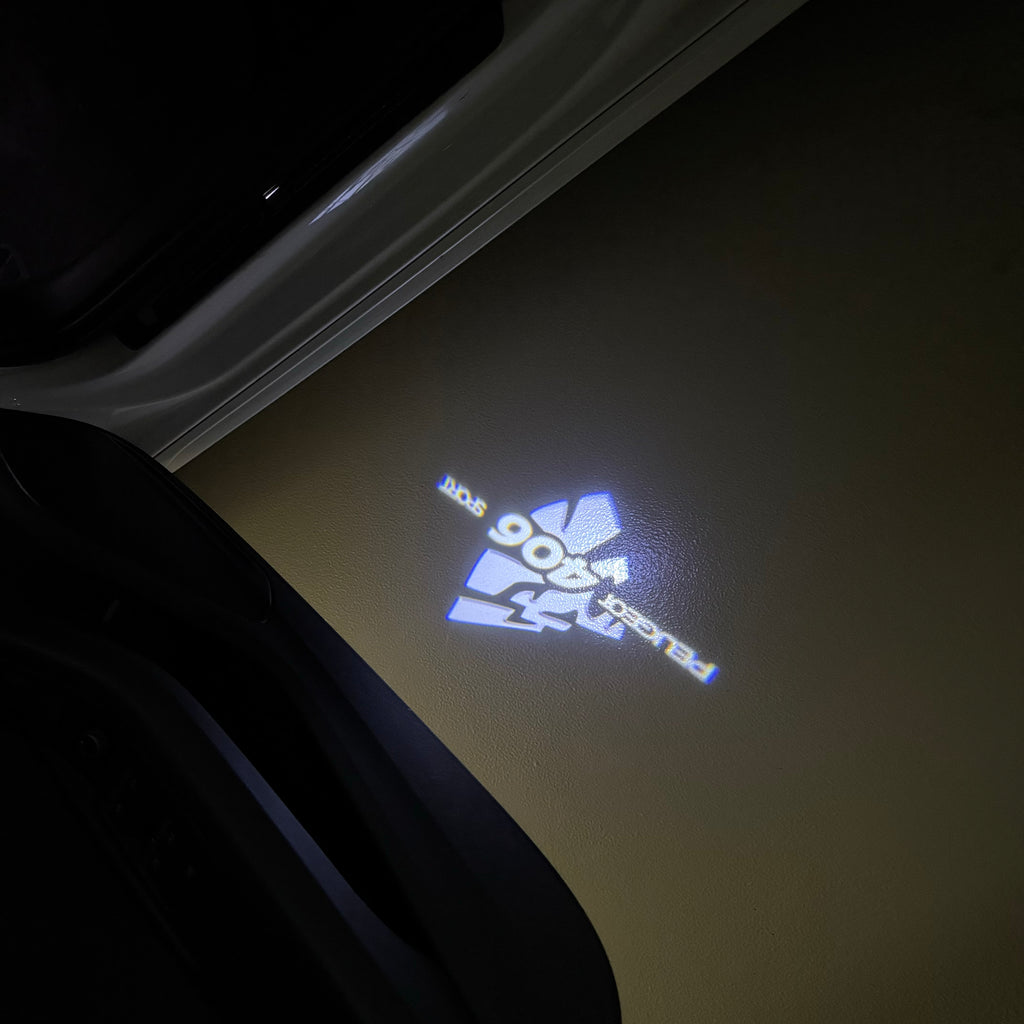 PEUGEOT  406 SPORT  LOGO PROJECTOT LIGHTS (quantity 1 = 1 sets/2 door lights) Nr.6024q30