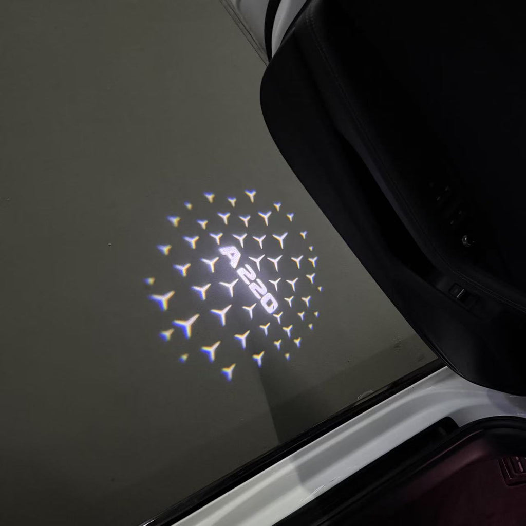 LUCI PROIETTORI LOGO MERCEDES BENZ Nr.03 (quantità 1 = 1 set / 2 luci porta)