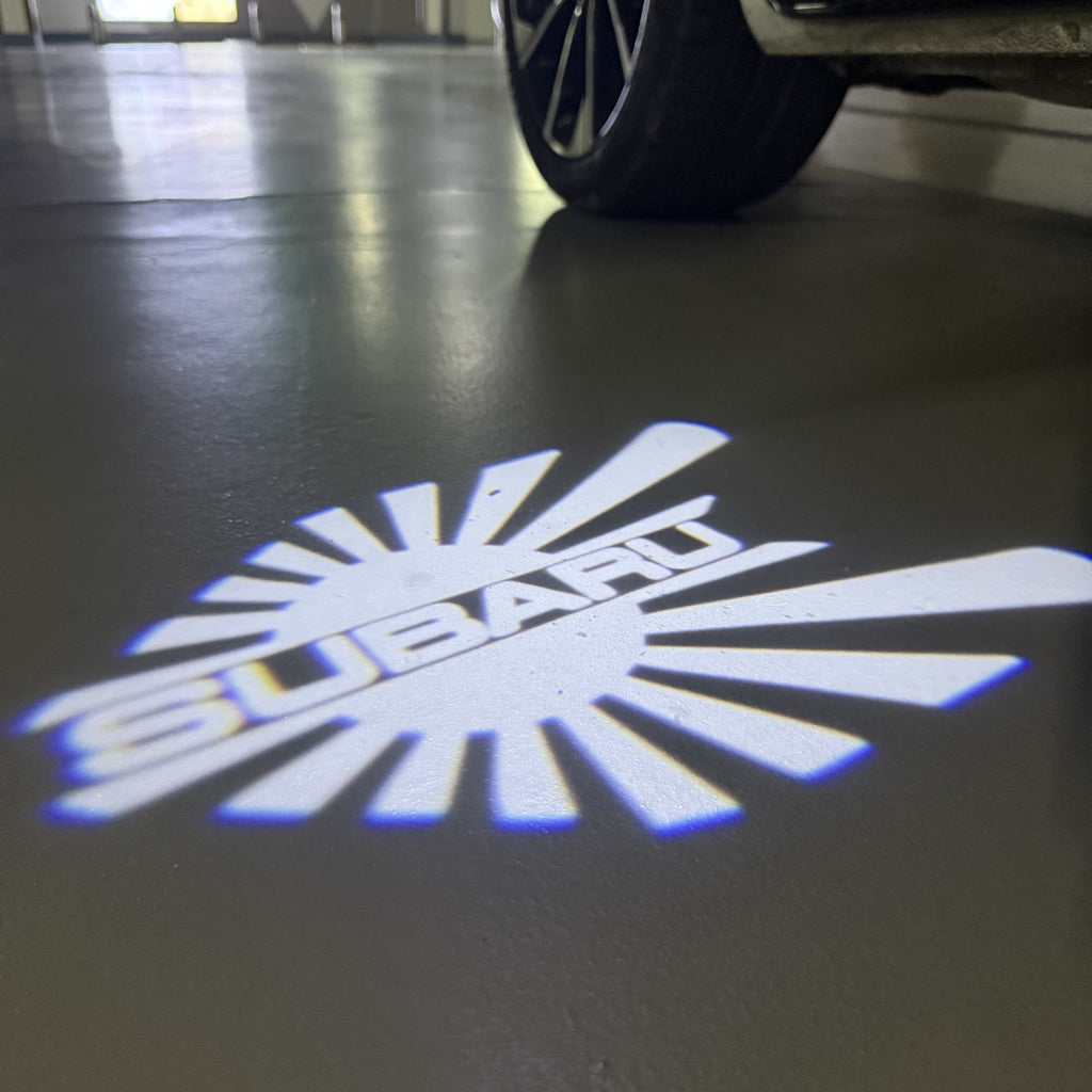 SUBARU ORIGINAL LOGO PROJECROTR LIGHTS (quantity 1 = 1 sets/2 door lights) Nr.10