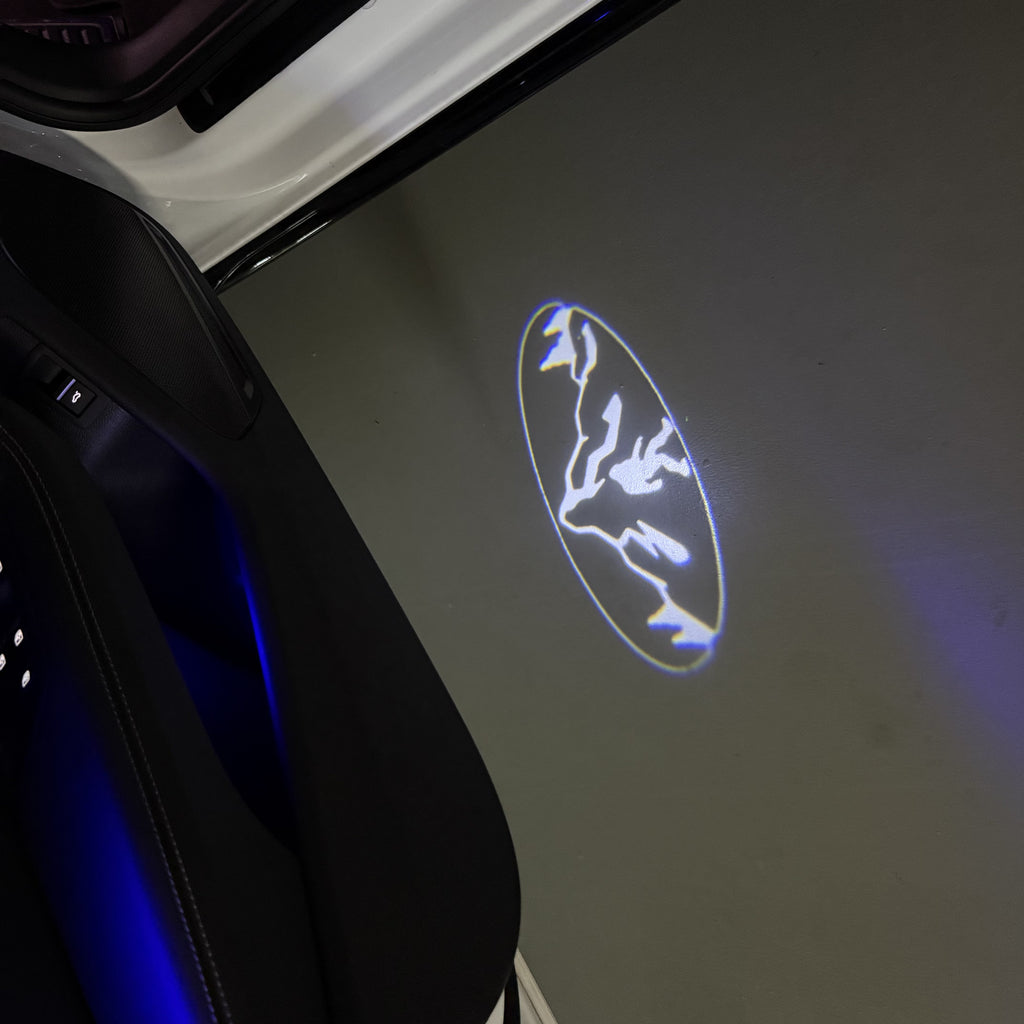 SUBARU ORIGINAL LOGO PROJECROTR LIGHTS (quantity 1 = 1 sets/2 door lights) Nr.03A4