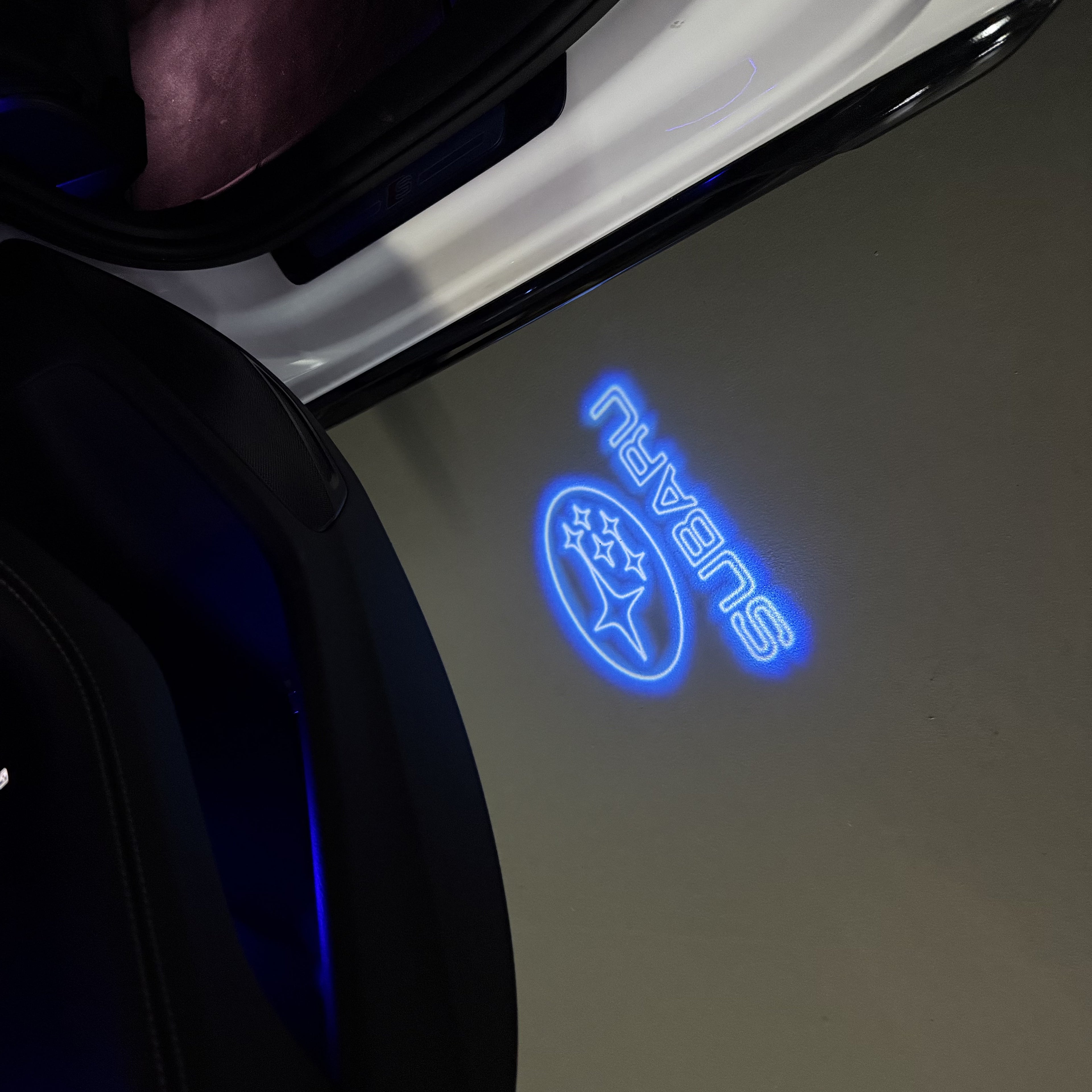 SUBARU ORIGINAL LOGO PROJECROTR LIGHTS (quantity 1 = 1 sets/2 door lights) Nr.9